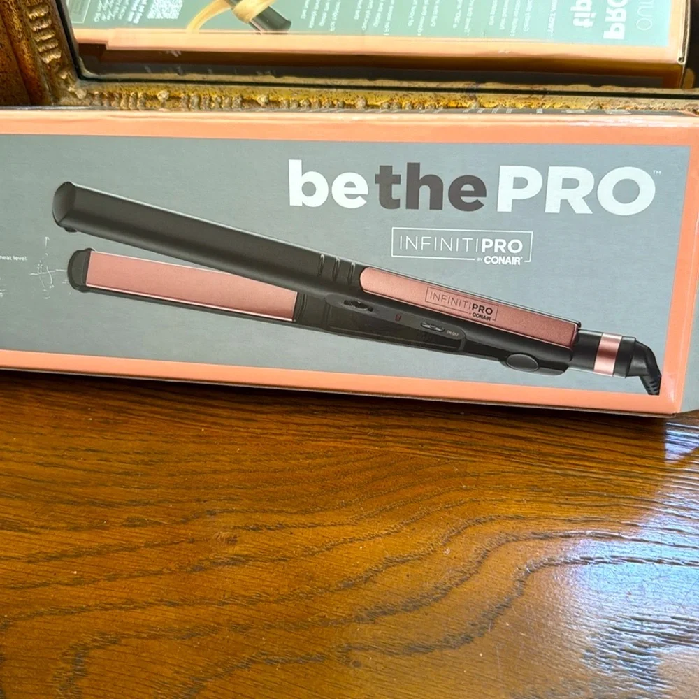 New InfinitiPRO Conair Hair Straightener. Rose gold ceramic, provides even heat.